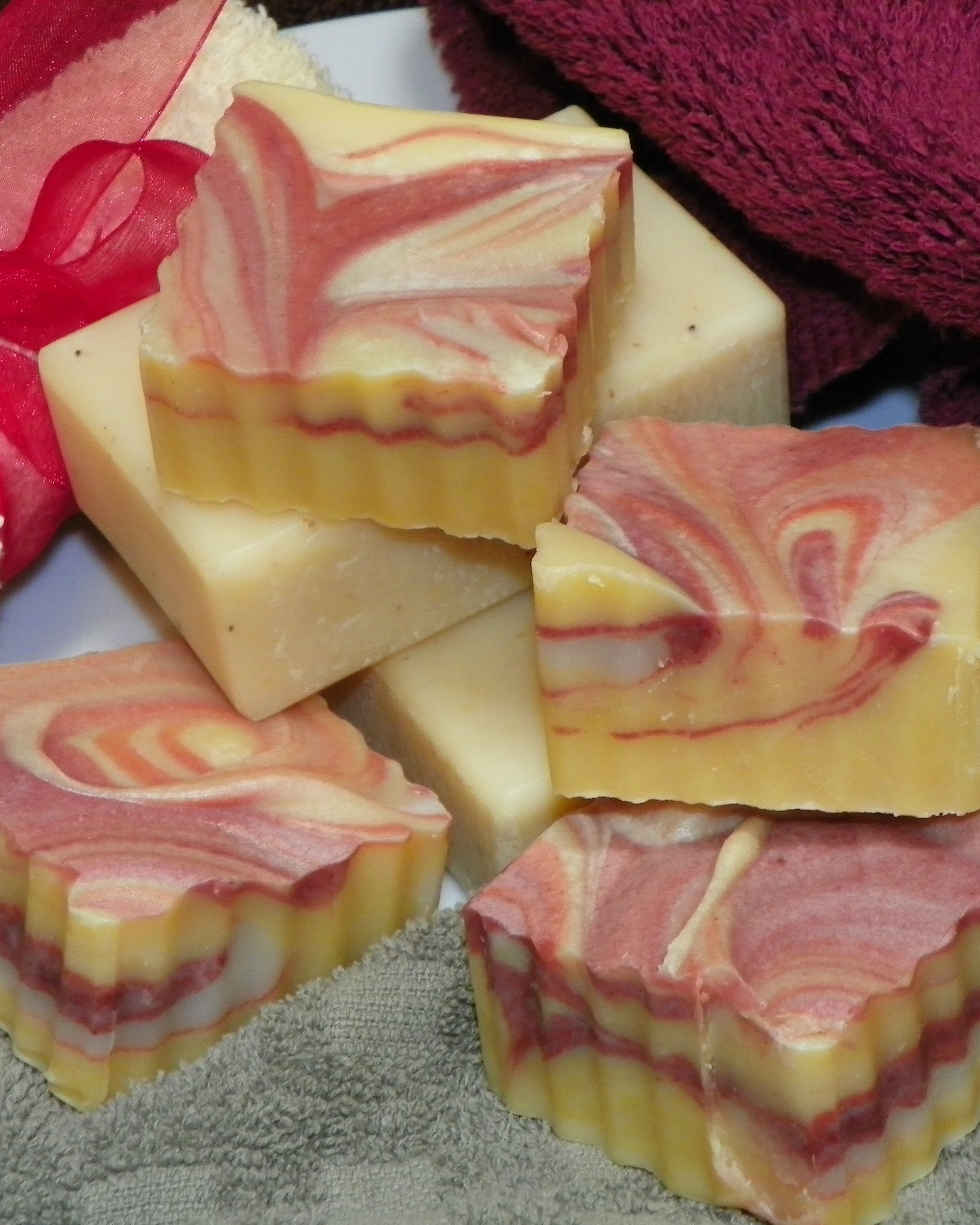 Yellow handmade soap, naturally colored with turmeric and rose clay.